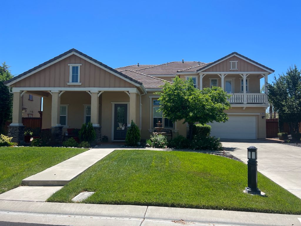 Before: Home exterior before Milestone Painting