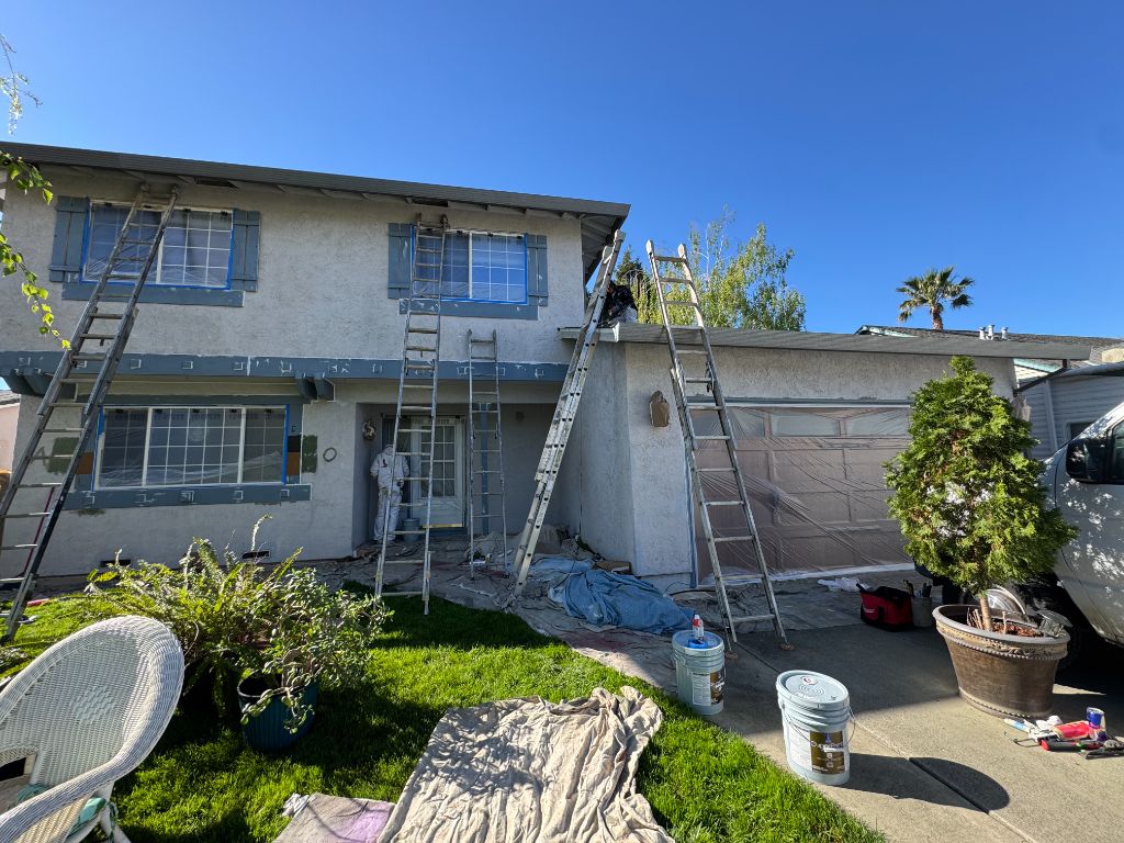 Milestone Painting crew working on exterior home painting in Vacaville CA