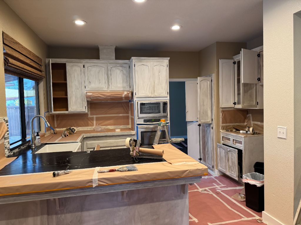 Before: Dated kitchen with oak cabinets needing a refresh