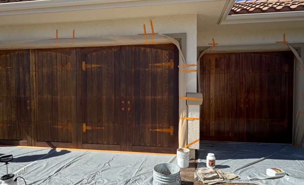 Before: Garage doors being prepped for dark walnut stain